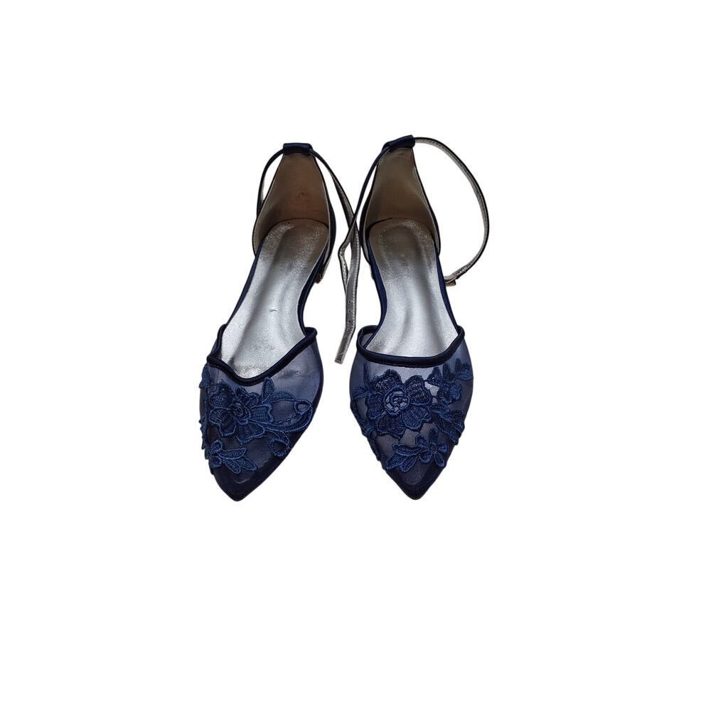 womens flats with netting toes and strap heel.